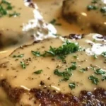 Amish Hamburger Steak Bake served on a plate, showcasing the rich flavors and texture
