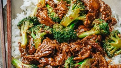 Delicious plate of Chinese Beef and Broccoli stir-fry with tender meat and vibrant vegetables.