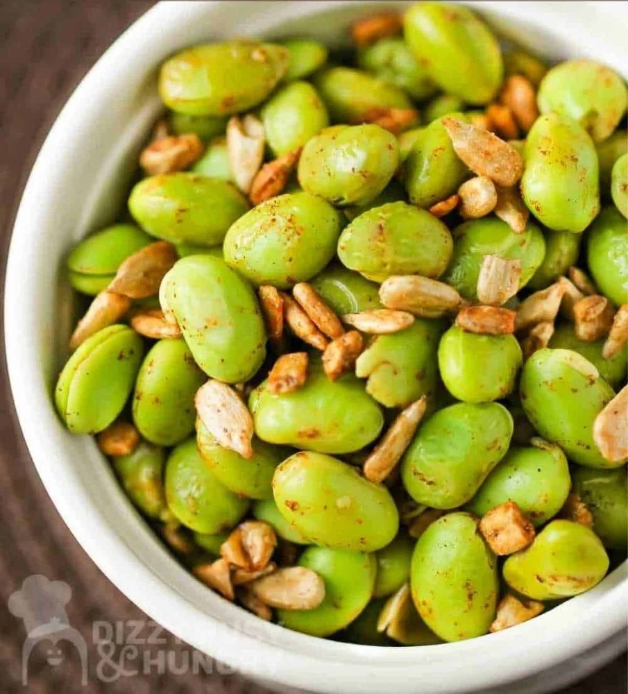 Delicious Chipotle Lime Edamame served in a bowl with lime slices.
