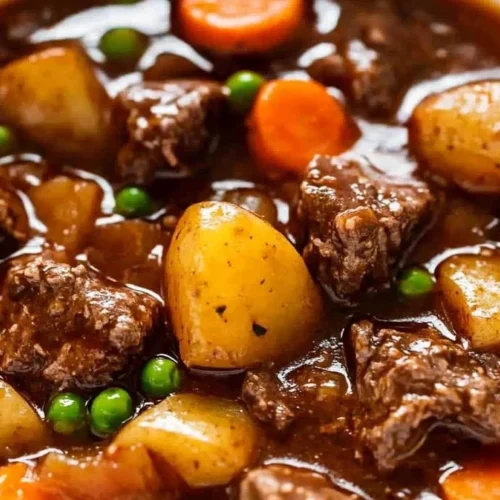 Bowl of comforting crockpot beef stew with hearty vegetables