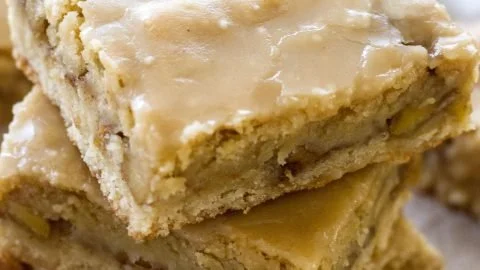 Maple glazed apple blondies topped with syrup